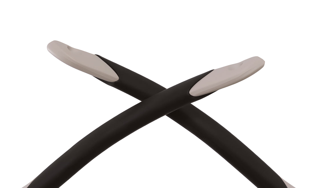 Close-up of cycling sunglasses arms with black frames and white rubberized tips
