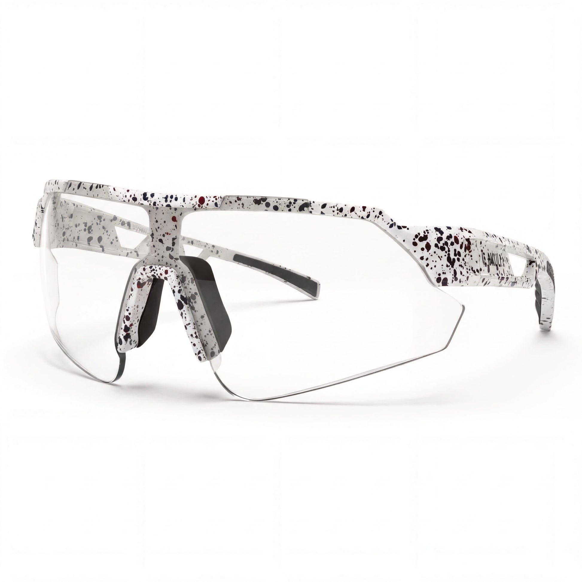 Sunglasses with a speckled pattern on a white background