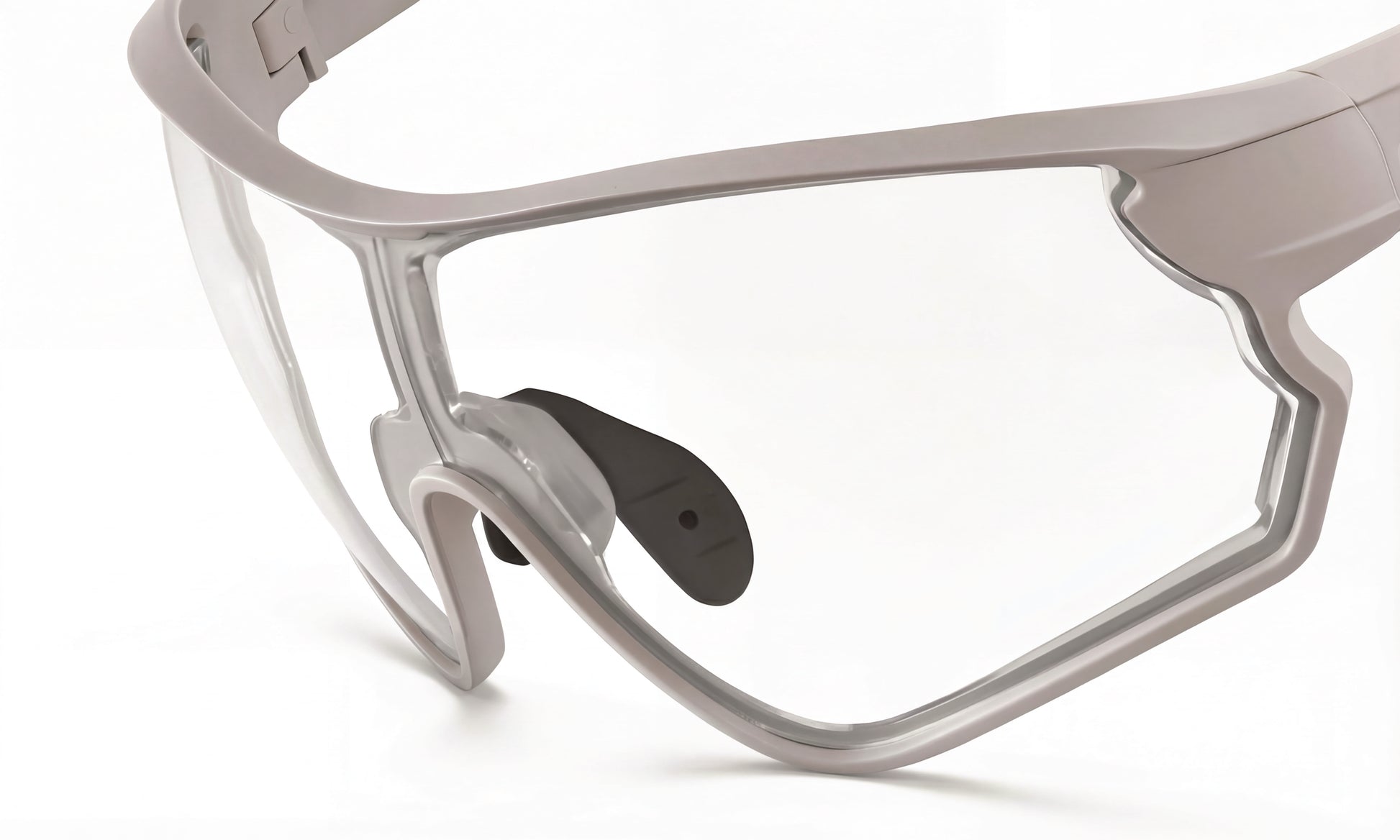Close-up of performance cycling sunglasses with clear RX lenses and aerodynamic frame