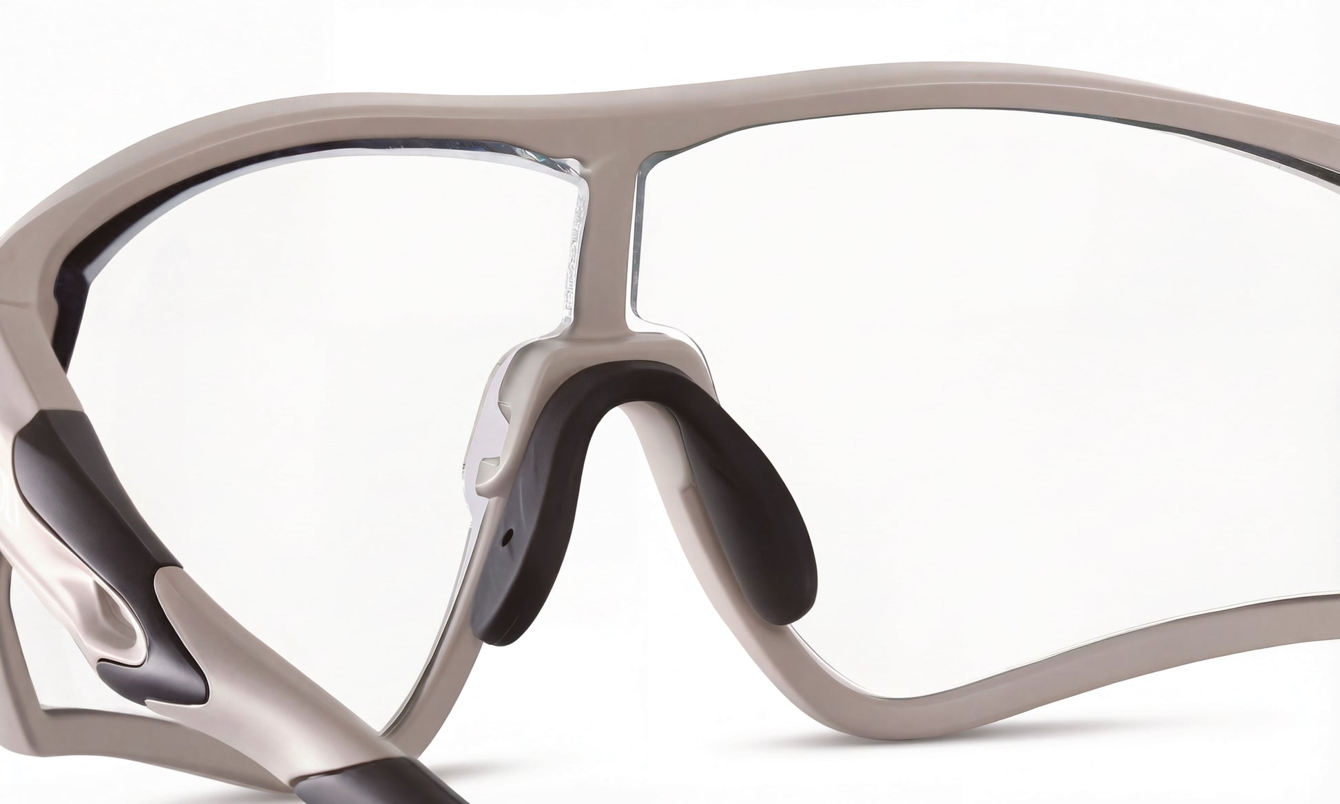 Prescription cycling sunglasses with clear lenses and a performance frame, close-up view