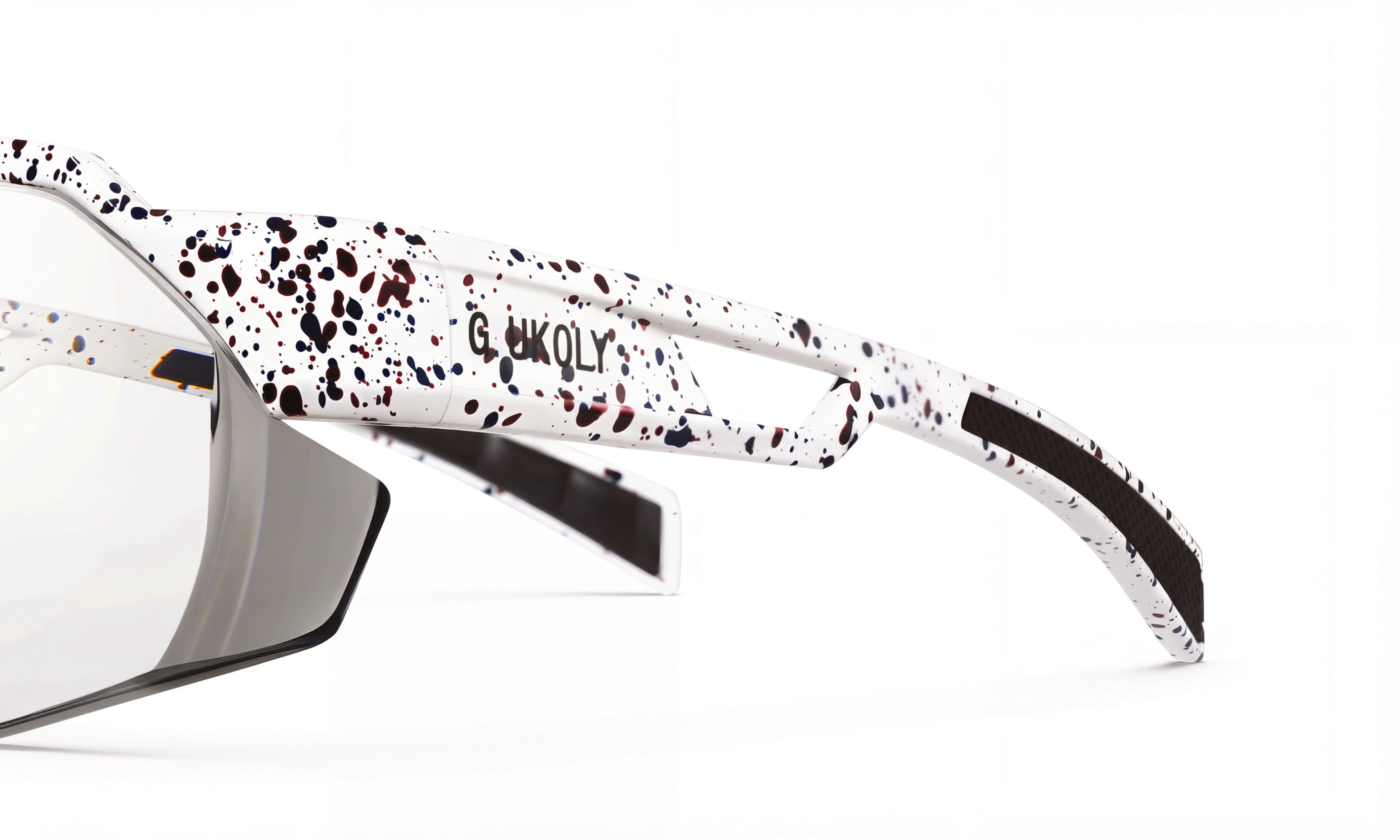 White cycling sunglasses with red and black splatter pattern, performance frame close-up